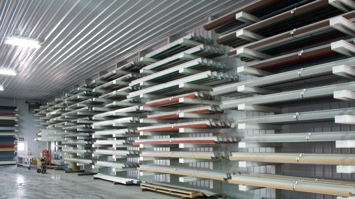 Racks of color matched metal trim and flashing components at the steel supplier